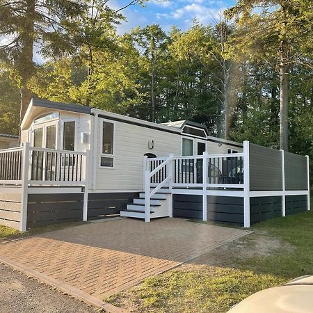 Percy Wood Lodges With Hot Tubs Swarland Exterior photo