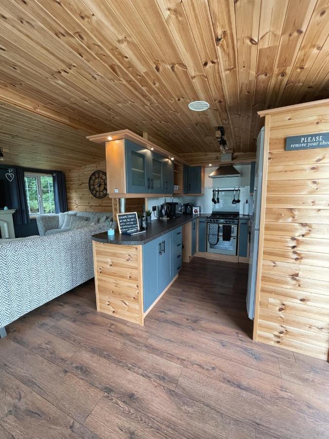 Percy Wood Lodges With Hot Tubs Swarland Exterior photo