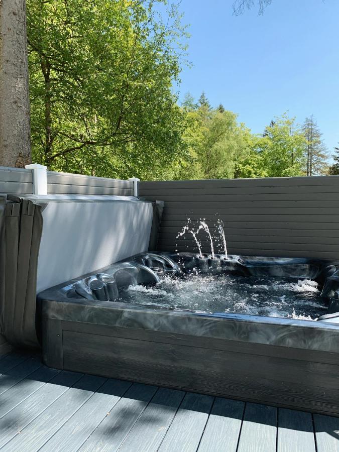 Percy Wood Lodges With Hot Tubs Swarland Exterior photo