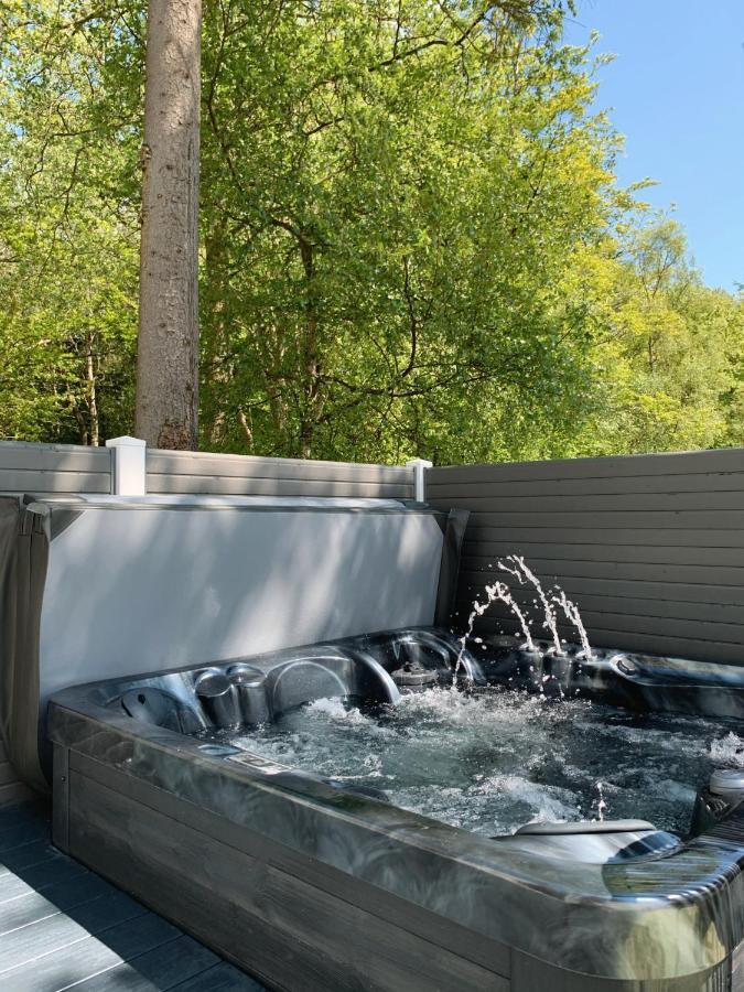 Percy Wood Lodges With Hot Tubs Swarland Exterior photo